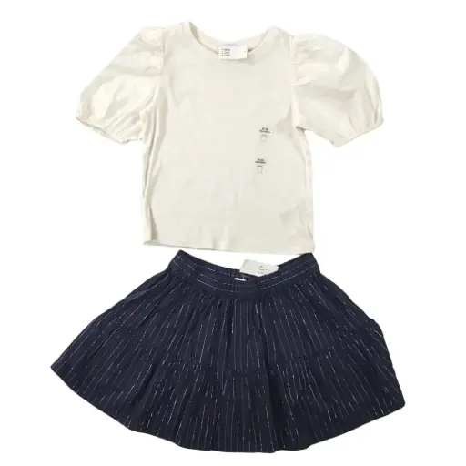 Blusa corta ivory y falda azul marino con líneas plateadas, talla 8 niña